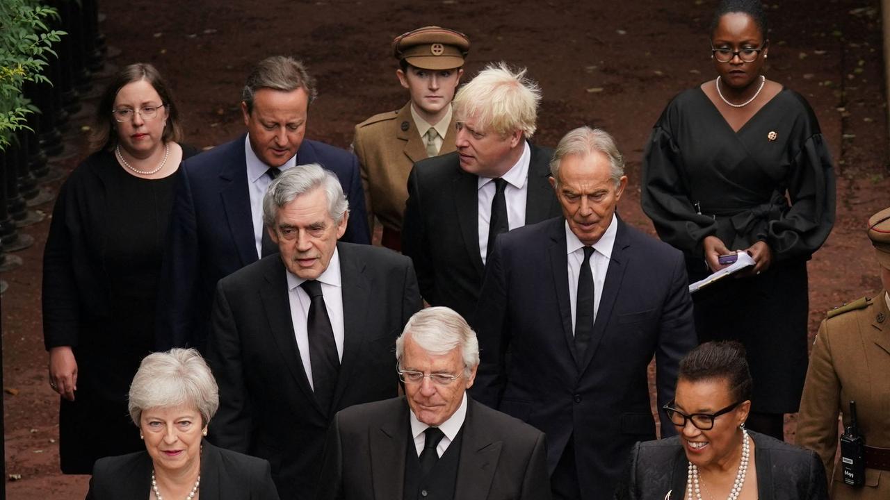 Britain's former Prime Ministers Theresa May, John Major, and Baroness Scotland, Gordon Brown, Tony Blair, David Cameron and Boris Johnson, arrive for a meeting of the Accession Council inside St James's Palace in London. Picture: AFP