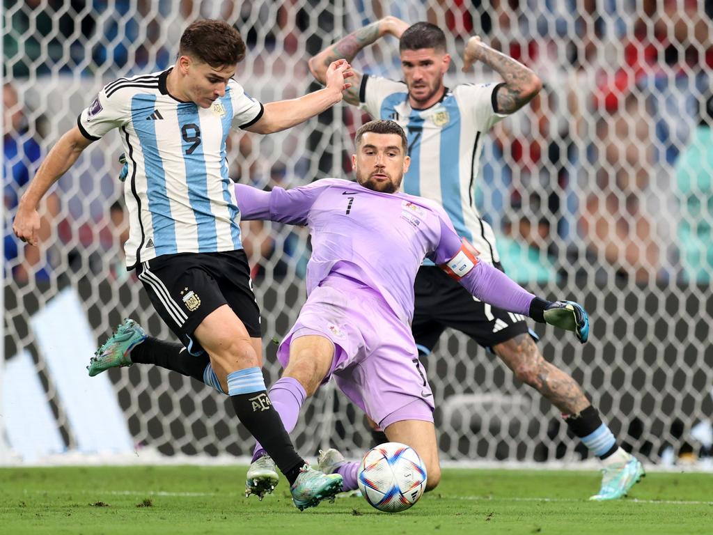 Julian Alvarez of Argentina scores the team's second goal past Mathew Ryan. Picture: Alex Pantling/Getty Images