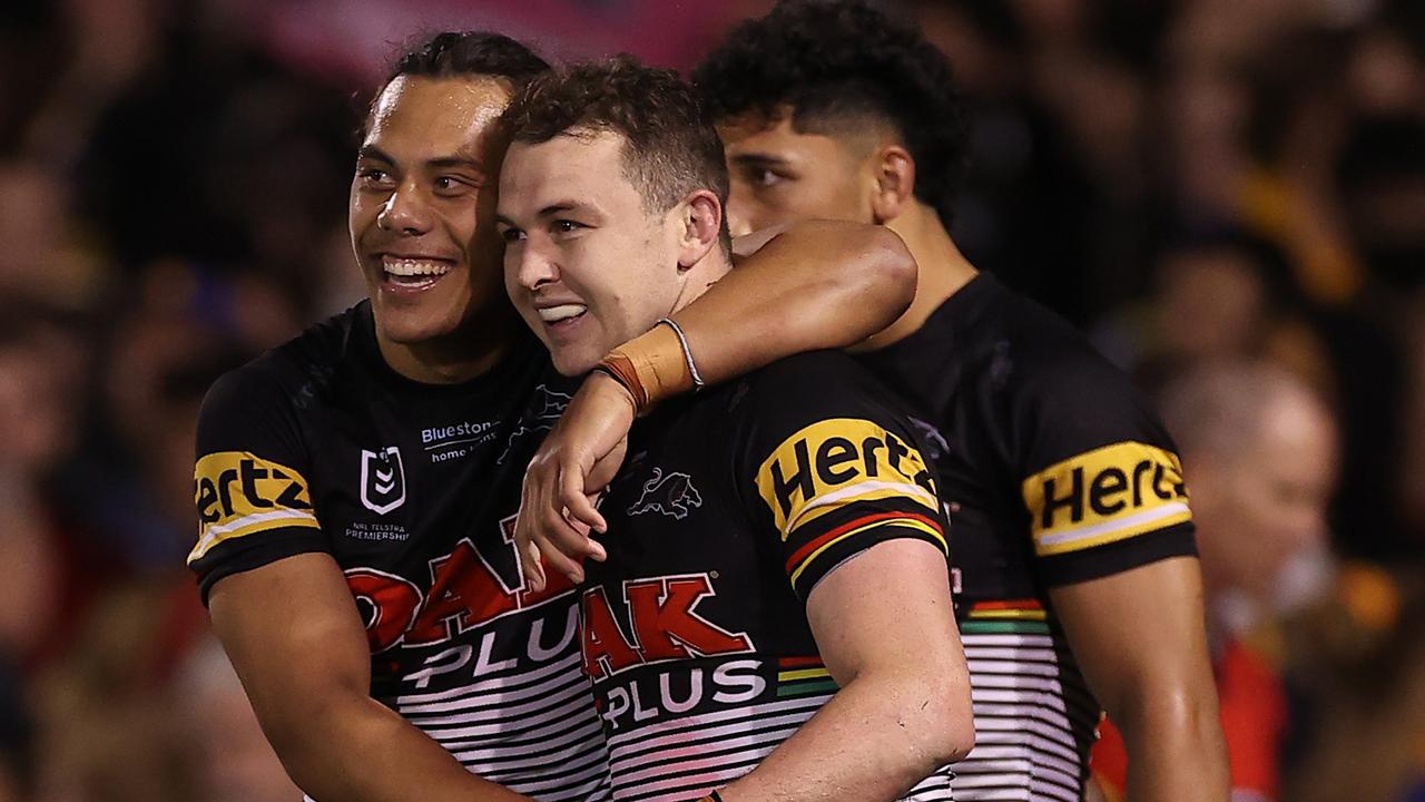 PENRITH, AUSTRALIA - SEPTEMBER 09: Dylan Edwards of the Panthers celebrates with Jarome Luai of the Panthers after scoring a try during the NRL Qualifying Final match between the Penrith Panthers and the Parramatta Eels at BlueBet Stadium on September 09, 2022 in Penrith, Australia. (Photo by Mark Kolbe/Getty Images)