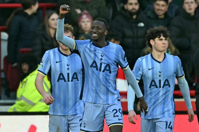 Pape Matar Sarr (centre) sealed a huge win for Tottenham