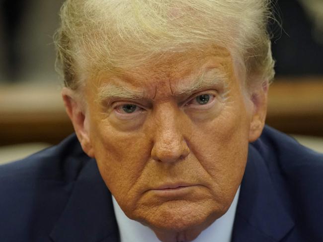 Former US President Donald Trump prepares to testify during his trial at New York State Supreme Court in New York, on November 6, 2023. The 77-year-old once and potentially future president is expected to testify at his civil trial in which he stands accused of fraudulently inflating those famous assets to advance his real estate empire. (Photo by Eduardo MUNOZ ALVAREZ / POOL / AFP)