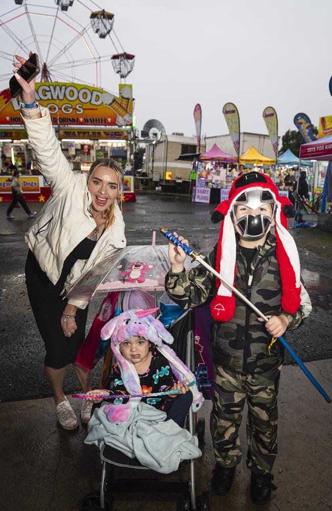 Sarah Read with her kids Tjala Walong and Rylen Weatherall at the Toowoomba Royal Show, Saturday, April 20, 2024. Picture: Kevin Farmer