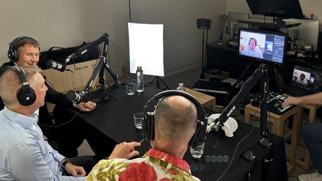 Jeff Browne, Andrew Pridham and Adam Spencer speak with Gillon McLachlan on the screen. Picture: Supplied