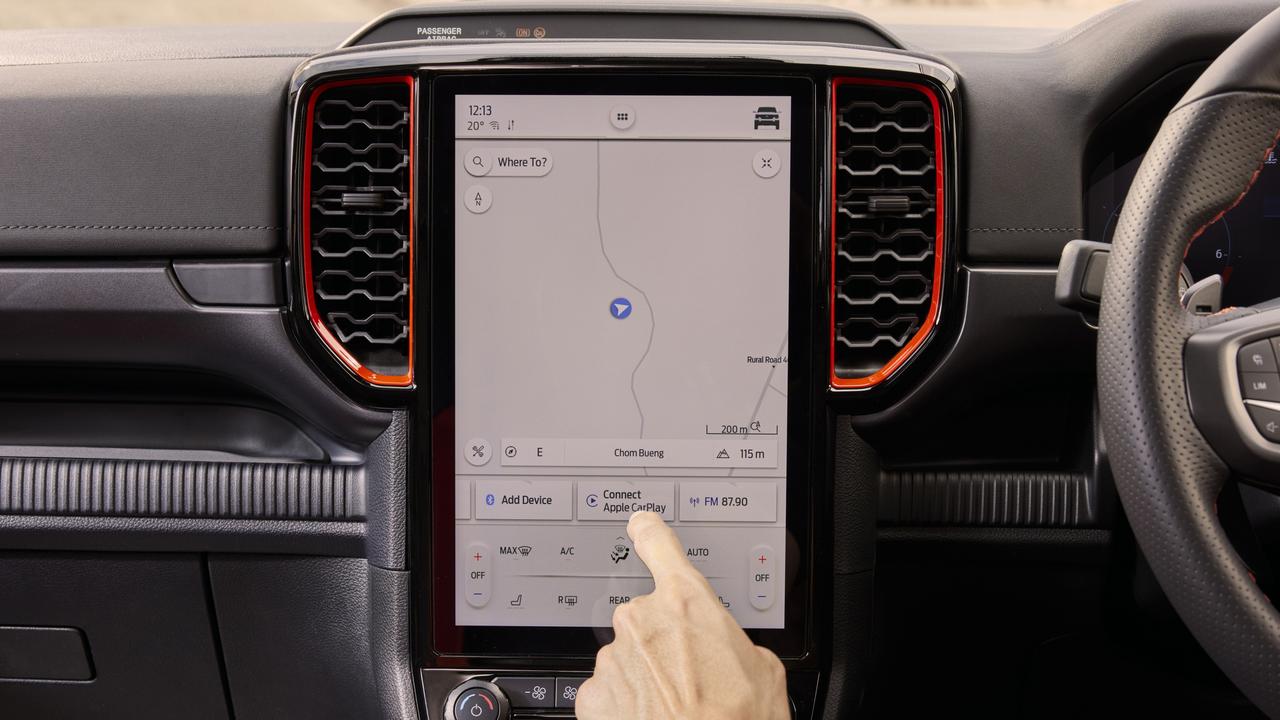 A giant tablet-style screen dominates the dash.