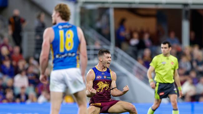 BRISBANE, AUSTRALIA – MAY 05: Josh Dunkley of the Lions celebrates a goal during the 2024 AFL Round 08 match between the Brisbane Lions and the Gold Coast SUNS at The Gabba on May 05, 2024 in Brisbane, Australia. (Photo by Russell Freeman/AFL Photos via Getty Images)