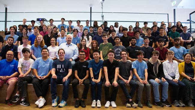 WiseTech CEO and founder Richard White with a cohort of the company's "earn and learn" students.