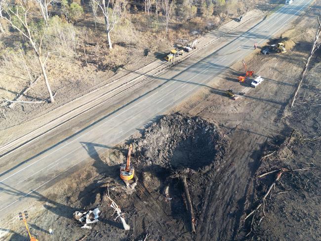 Recovery works taking place on the Bruce Highway where an ammonium nitrate truck exploded near Bororen. Photo - TMR