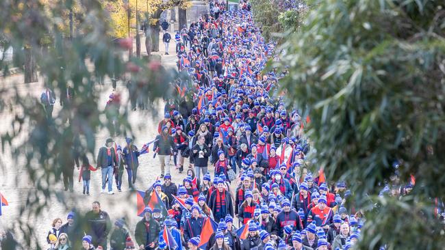 A long line of footy fans at The Big Freeze march. Picture: Jake Nowakowski