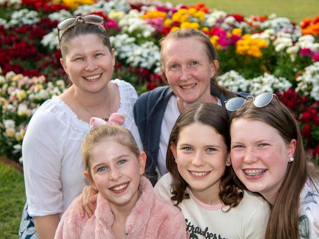 Caroline Berting (back-left) and Jenna Gudze and front; Felicity Berting, Zoe Berting and Sally Berting in Laurel Bank Park for the Carnival of Flowers, Sunday, September 22, 2024. Picture: Bev Lacey