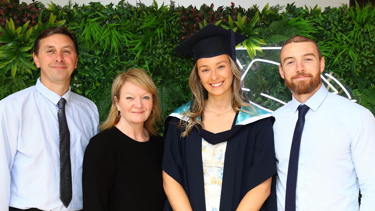 Deakin University graduate Eliza Martino with parents Rachel and Ernie and partner Glen Coleman. Picture: Alison Wynd