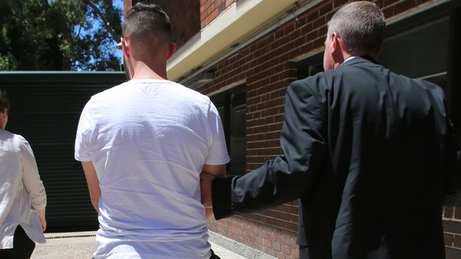 Nicolas Calci being led away. Picture: NSW POLICE MEDIA Picture: NSW POLICE MEDIA