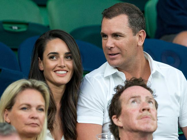 Former North Melbourne player Wayne Carey with girlfriend Jessica Paulke at Rod Laver Arena at the 2018 Australian Open.