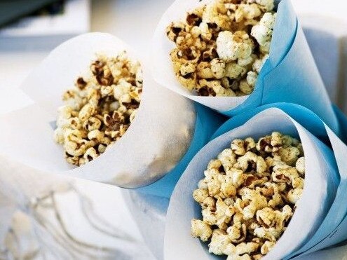 Wrap small portions of popcorn in baking paper.