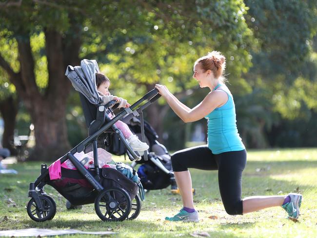 Felicity Sutherland with Maxwell, 3, and Nina, 1, uses the pram as part of her workout. Picture: Bob Barker