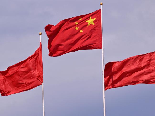 A Chinaâs national flag flutters during the Forum China-Africa Cooperation (FOCAC) summit at the Great Hall of the People in Beijing on September 5, 2024. (Photo by Adek BERRY and ADEK BERRY / POOL / AFP)