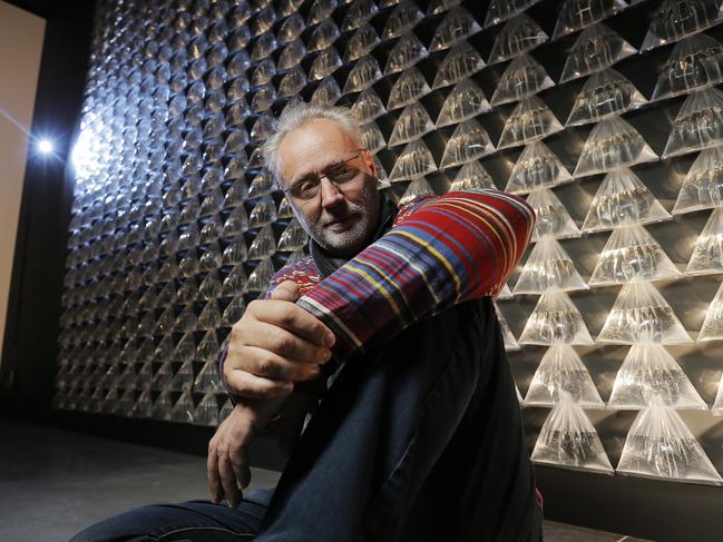 <i>ZERO </i>guest curator Mattijs Visser in front of a piece by his uncle, Dutch artist Henk Peeters. Picture: MATHEW FARRELL