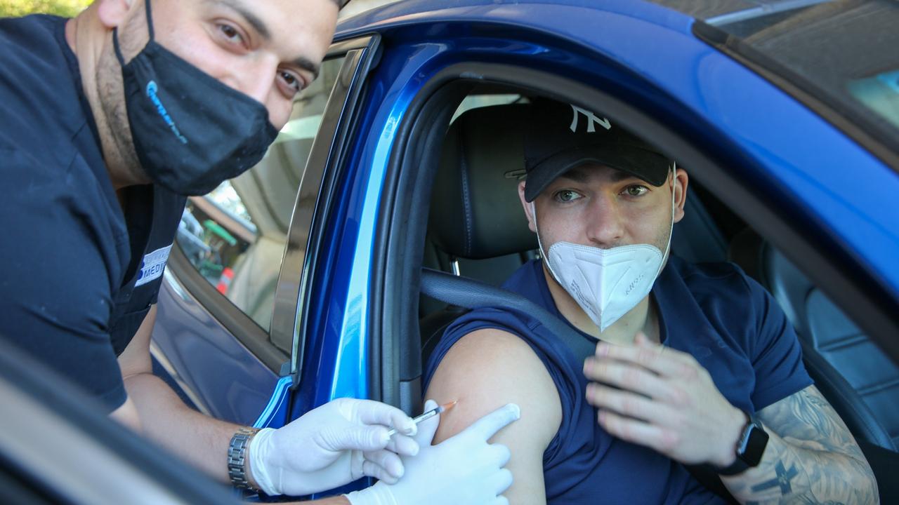 Bulldogs winger Nic Cotric received his jab last month at a drive-through vaccination clinic.