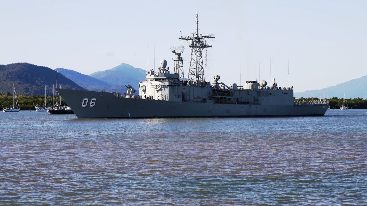 Royal Australian Navy personnel commemorate Anzac Day at sea