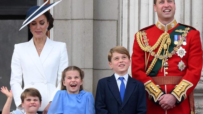 William’s family, including Louis pulling a face. Picture: Daniel Leal/ AFP