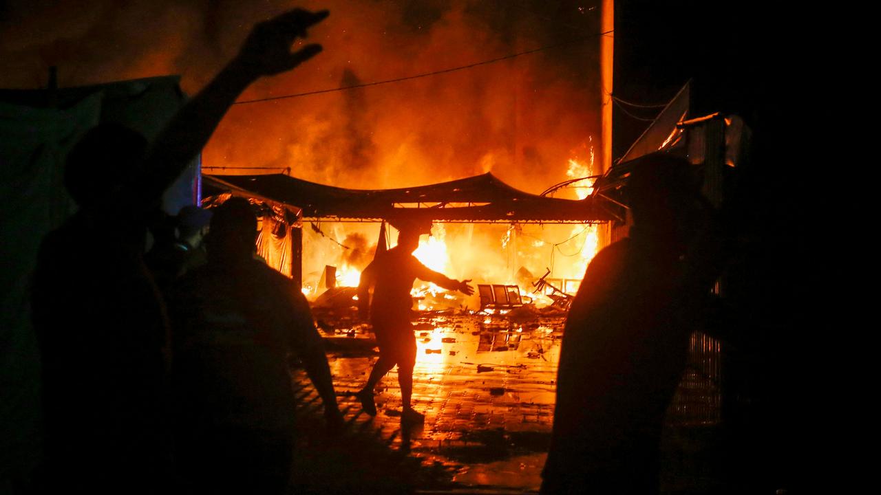 Fire erupts inside the walls of Al-Aqsa Martyrs’ Hospital in Deir al-Balah after an Israeli strike. Picture: UNRWA/AFP