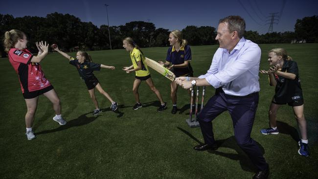 Roberts with his five cricket mad daughters (from left) Emma, Mia, Sophie, Kate and Jess.