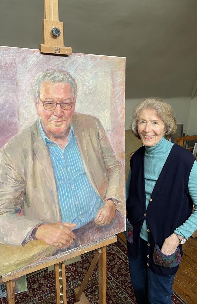 June Mendoza with her portrait of Alexander Downer. Picture: Supplied