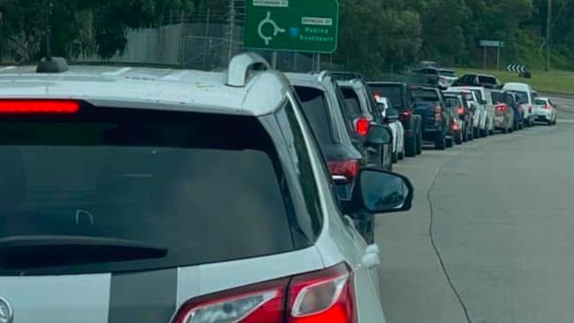 Line up of vehicles for sand bagging services at Reedy Creek made available by Gold Coast City Council in preparing for Cyclone Alfred.