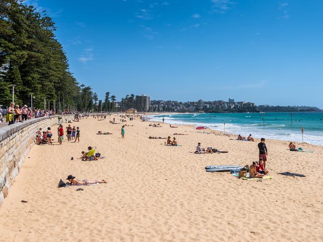 Sydney, Australia - November 9, 2014: Manly Beach on a sunny, sunday morning, with tourists and sightseers enjoying the water, Sydney, Australia. People having fun on Manly beach. Picture: istock