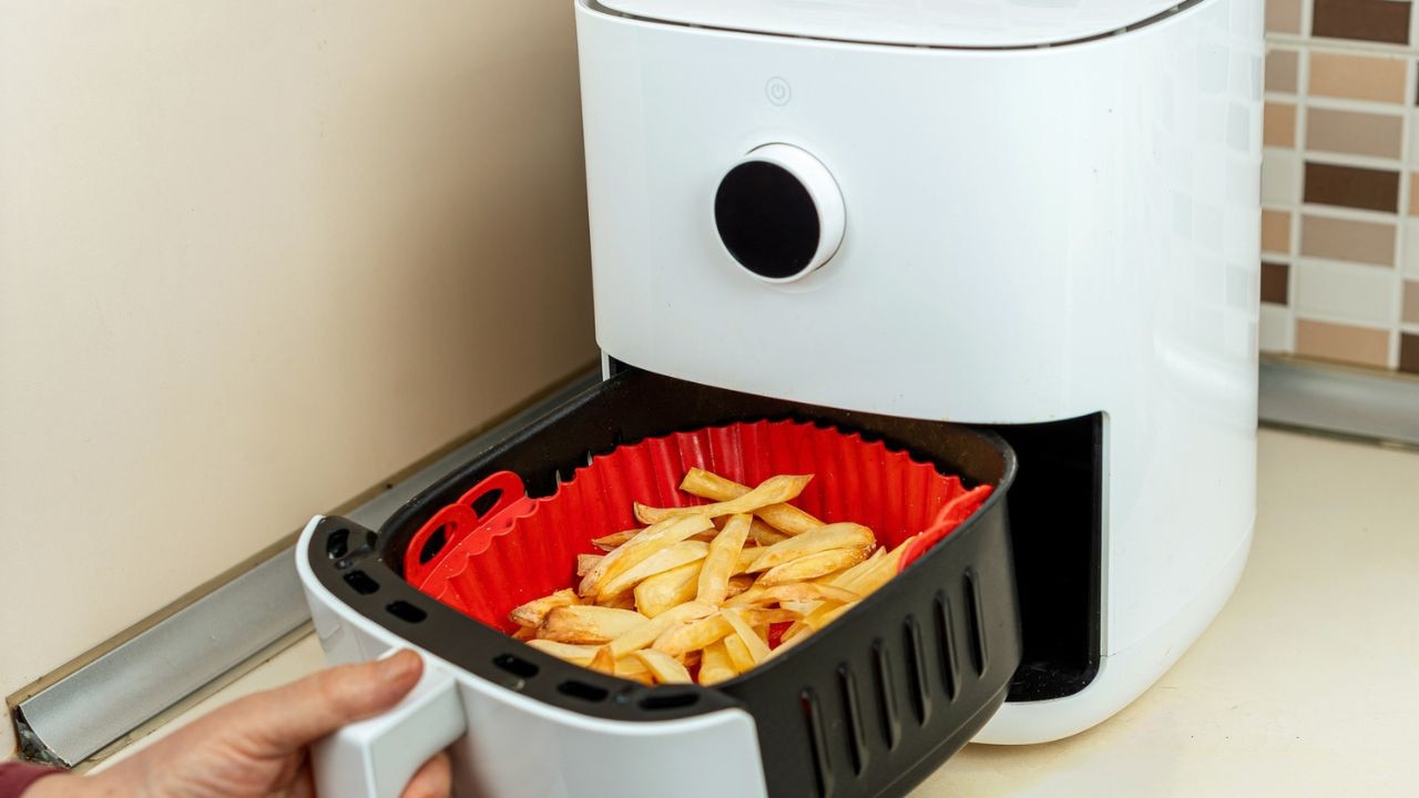 Accessorise your air fryer with these handy liners and attachments for even, convenient and mess-free cooking. Picture: iStock/herstockart.