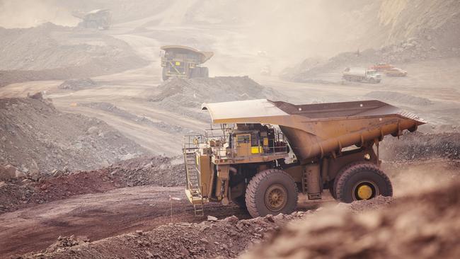 EY says miners need to turn away from acquisitions to finding ways to open more mines.