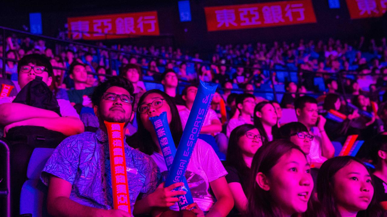 Spectators watch the League of Legends gaming tournament in Hong Kong. Picture: AFP