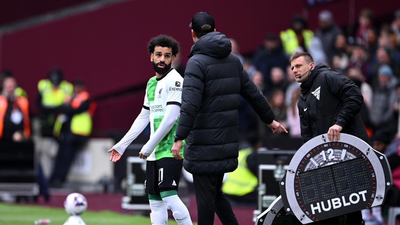 Salah and Klopp have words on the touchline. (Photo by Justin Setterfield/Getty Images)