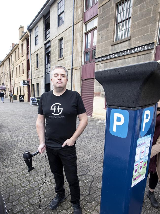 Edwin Johnstone, co-owner of Some Hallucination hairdressing salon at Salamanca is not happy about the parking price increase near his business. Picture Eddie Safarik