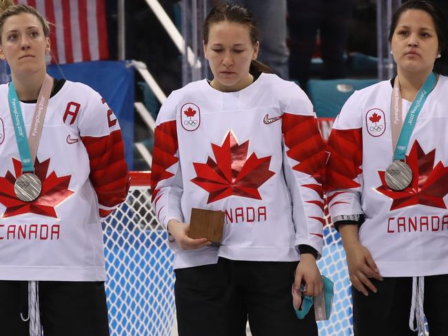 GANGNEUNG, SOUTH KOREA - FEBRUARY 22:  Jocelyne Larocque #3 of Canada refuses to wear her silver medal after losing to the United States in the Women's Gold Medal Game on day thirteen of the PyeongChang 2018 Winter Olympic Games at Gangneung Hockey Centre on February 22, 2018 in Gangneung, South Korea.  (Photo by Bruce Bennett/Getty Images)