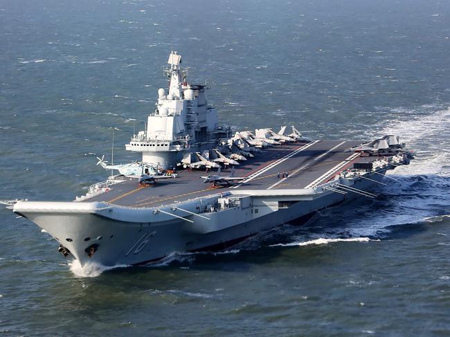 (FILES) This file photo taken on December 24, 2016 shows the Liaoning, China's only aircraft carrier, sailing during military drills in the Pacific. China's only aircraft carrier has entered the Taiwan Strait in a highly symbolic show of strength, but Taiwan insisted on January 11, 2017 there was no need for panic even as tensions boil over the island's diplomatic status. / AFP PHOTO / STR / China OUT