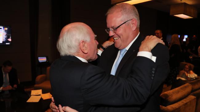 Prime Minister Scott Morrison celebrated his win with former Prime Minister John Howard. Picture: Adam Taylor