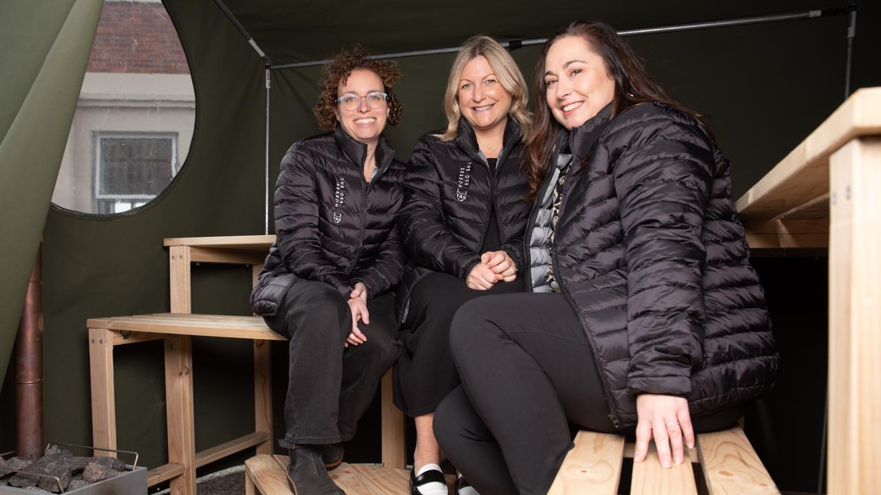 Executive Director of Beaker Street Festival Margot Adler, CEO of Tourism Tasmania Sarah Clark and CEO of Tourism Industry Council Tasmania, Amy Hills test out the makeshift sauna as part of the Hobartica festival. Picture: Linda Higginson