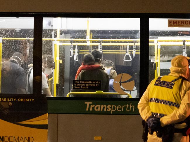 Evacuees arriving from Afghanistan are transported on a bus to a Perth hotel. Picture: Getty Images