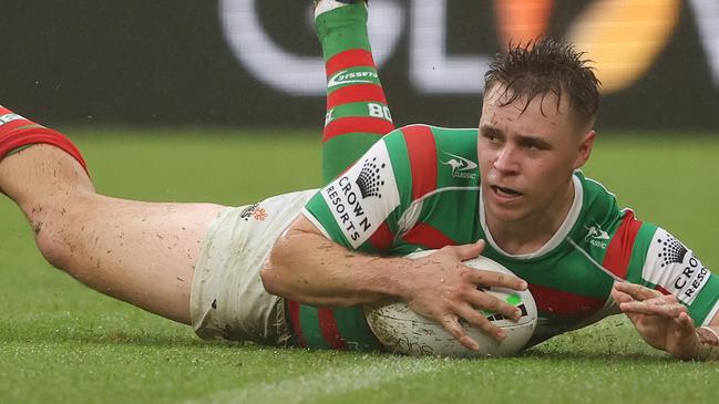 BRISBANE, AUSTRALIA - MAY 14: Blake Taaffe of the Rabbitohs scores a try during the round 10 NRL match between the New Zealand Warriors and the South Sydney Rabbitohs at Suncorp Stadium, on May 14, 2022, in Brisbane, Australia. (Photo by Chris Hyde/Getty Images)