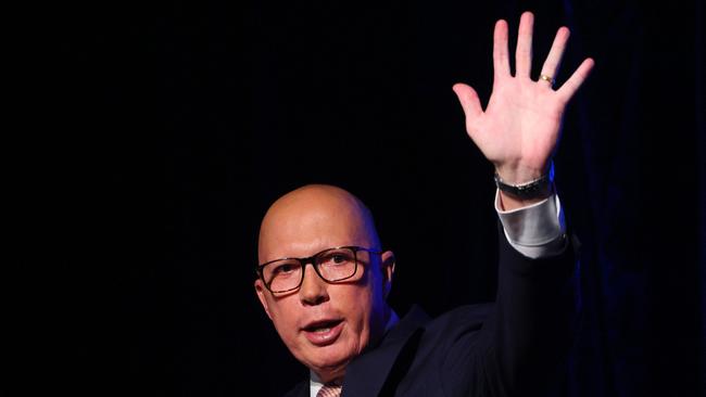 Australia's Opposition Leader Peter Dutton waves after conceding defeat in the general election at the Liberal Party election night event in Brisbane on May 3, 2025. Australia's right-leaning opposition leader Peter Dutton conceded defeat in a general election on May 3, saying he had spoken to Prime Minister Anthony Albanese. (Photo by Patrick Hamilton / AFP)