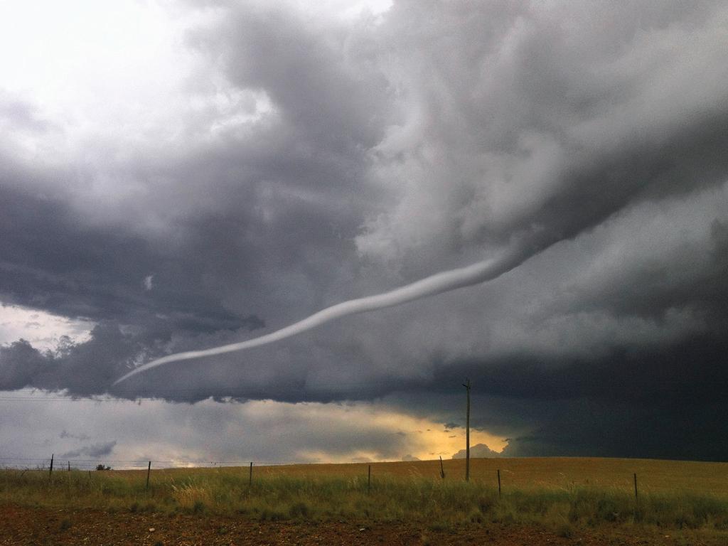 April: Funnel cloud north of Cooma, New South Wales. Photograph: Lucy Stevenson. When 25-year-old Lucy Stevenson spotted a long, twisting cloud from the Monaro Highway just north of Cooma on Boxing Day 2013, she didn’t know what it was. She snapped a picture on her iPhone, out of the window of her brother’s moving car, and posted it on Twitter. Lucy soon had her answer: It was a funnel cloud, created when water vapour in the air is condensed into droplets by rapidly rotating winds.