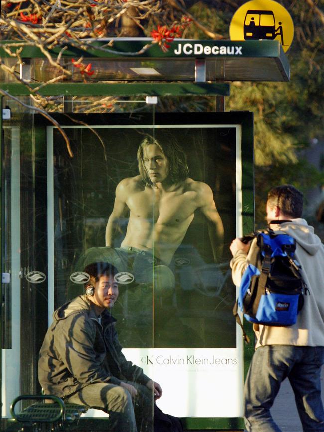 Model Travis Fimmel in a Calvin Klein poster at bus stop. Picture: Bob Barker.