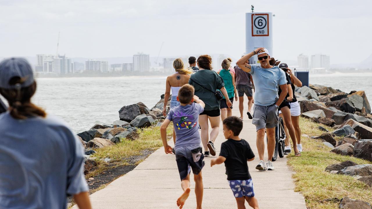 WATCH: Cyclonic swell attracts onlookers, lifeguards give stern warning