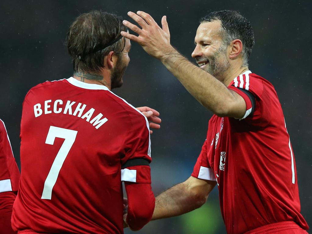 Great Britain and Ireland teammates David Beckham and Ryan Giggs celebrate during the David Beckham Match for Children in aid of UNICEF between Great Britain &amp; Ireland and Rest of the World at Old Trafford on November 14, 2015 in Manchester, England. Picture: Getty