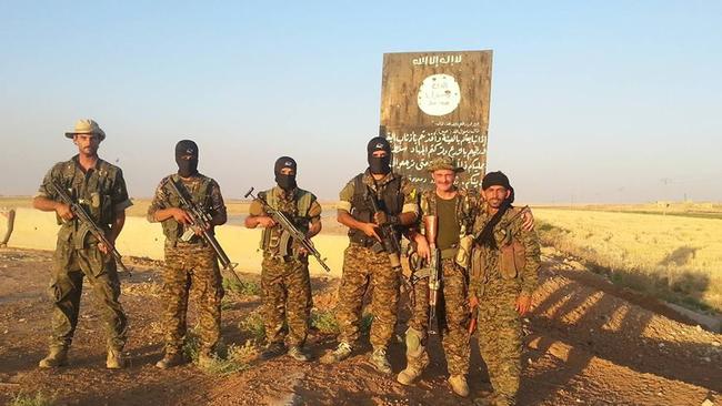 Reece Harding and fellow fighters in Syria.