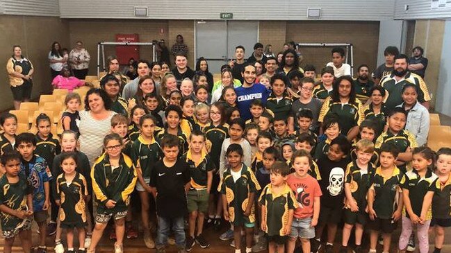 Isaiah Firebrace with children at his workshop in Wilcannia. Picture: Supplied/Isaiah Firebrace