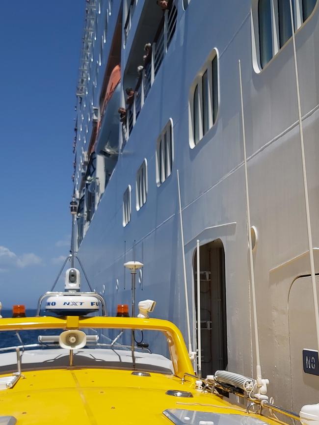 Yeppoon Rescue One dwarfed by the Silver Muse