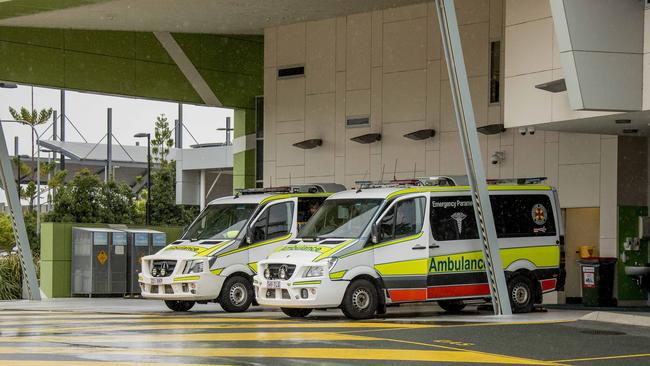 Ambulances parked at the Robina Hospital after ramping. Picture: Jerad Williams