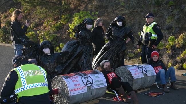 REBELS: Three women and one man have been arrested following a protest in New Town. Picture: Kenji Sato