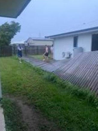Fence collapses in wild winds, Townsville. Source: Georgia Wood